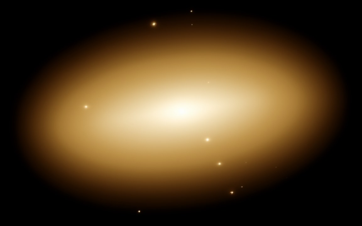 A vast golden-white oval of light filling most of the picture and fading smoothly towards its edges, with a few tiny orange points scattered around it in black space, an impression of the giant elliptical galaxy IC 1101.