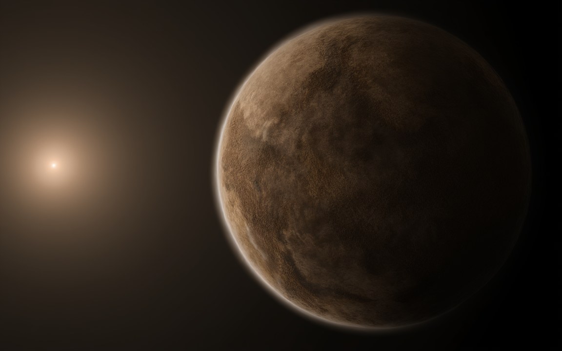 A rocky brown planet lit from the left by a dim, hazy star, an impression of TOI-700 d.